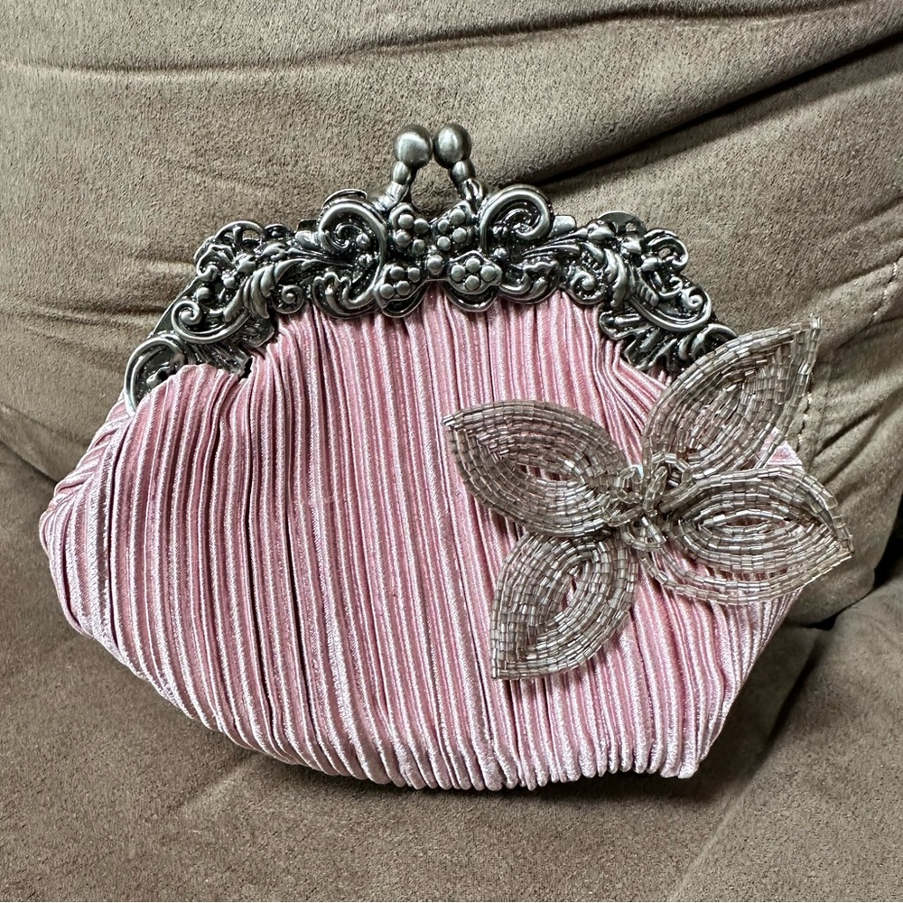 Pink beaded clutch by Kristine Accessories